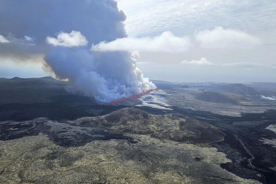 A volcano erupts in Grindavik, Iceland, Wednesday, May 29, 204. Wednesday, May 29, 2024. A volcano in southwestern Iceland is erupting, spewing red streams of lava in its latest display of nature’s power. A series of earthquakes before the eruption Wednesday triggered the evacuation of the popular Blue Lagoon geothermal spa. The eruption began in the early afternoon north of Grindavik, a coastal town of 3,800 people that was also evacuated. (Birn Oddsson/Iceland Civil Defense via AP)