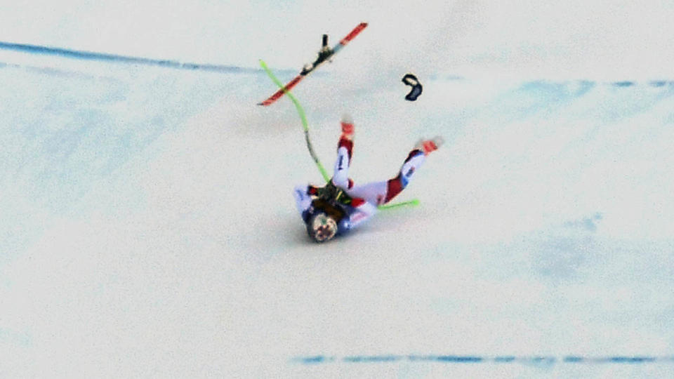 Marc Gisin falls during the FIS Alpine World Cup Men Downhill. (Photo by Alberto PIZZOLI / AFP / Getty Images)