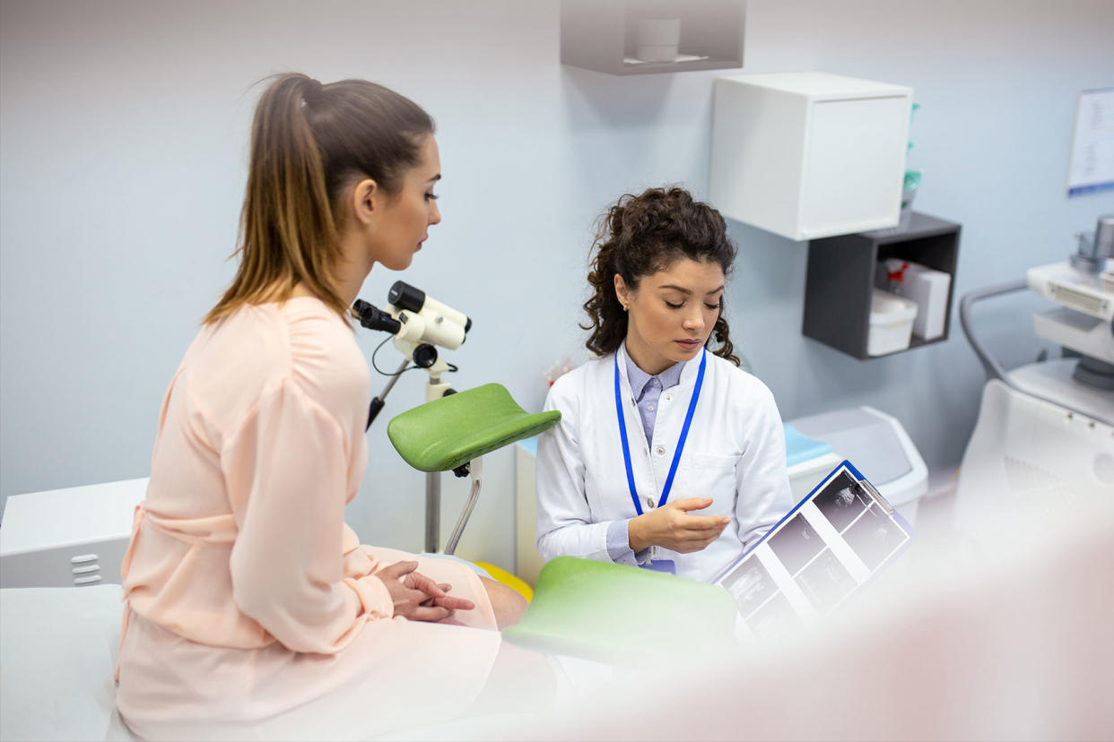 Gynecologist doctor and a patient Getty Images/stefanamer