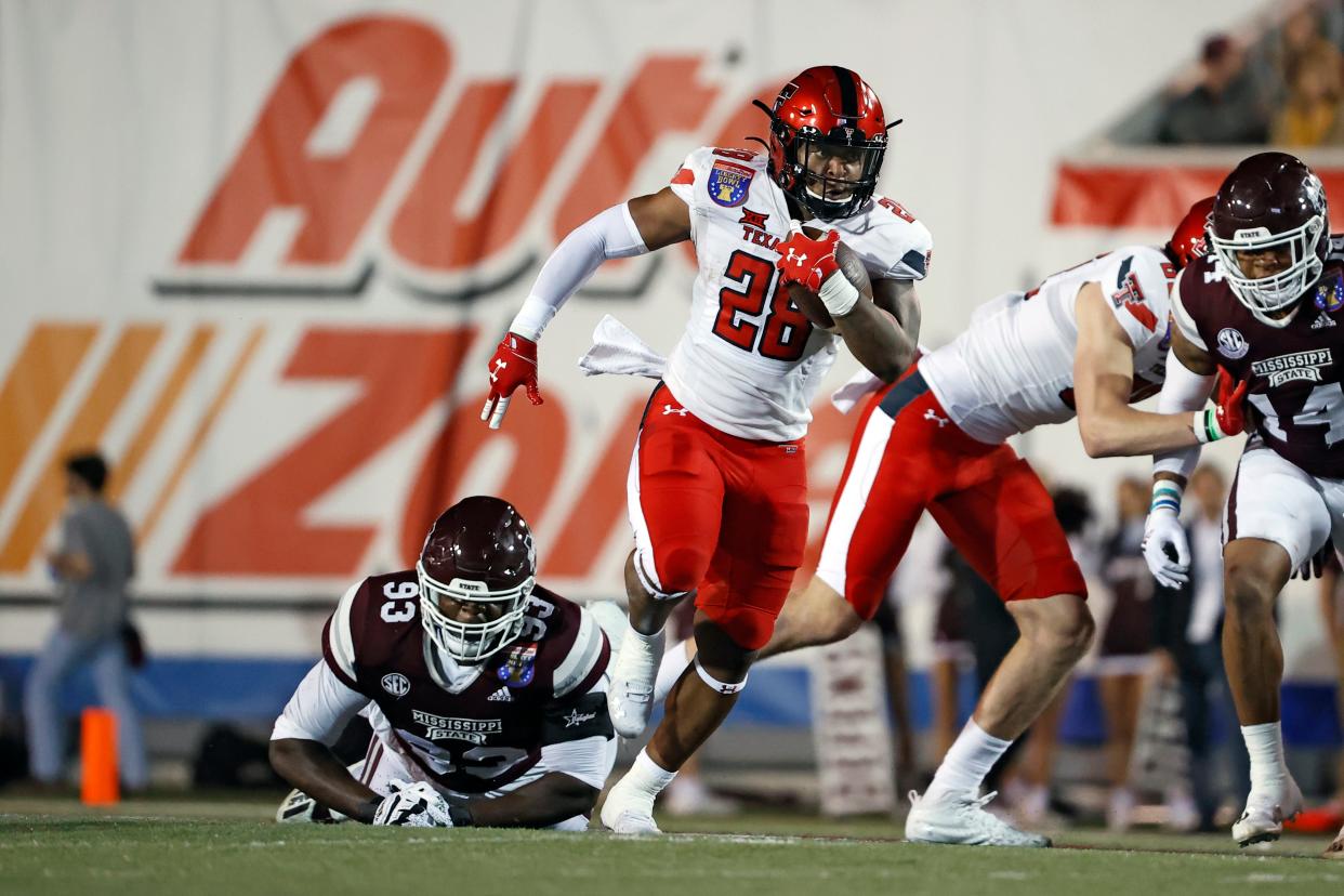 Texas Tech running back Tahj Brooks breaks loss against Mississippi State during the Red Raiders' 34-7 victory at the Liberty Bowl. Brooks finished the night with 107 rushing yards and finished the season with 568 yards, making him Tech's leading rusher.