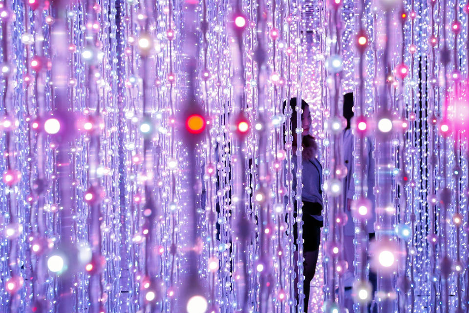 <p>Visitors look at digital light effects by Japan based digital art group teamLab during the ‘Dance! Art Exhibition, Learn and Play! Future Park’ in Taipei, Taiwan, Feb. 23, 2017. (Photo: Ritchie B. Tongo/EPA) </p>