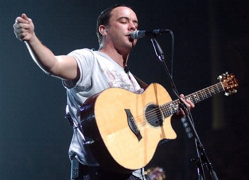 Dave Matthews sings during a performance by The Dave Matthews Band at the Qwest Center in Omaha, Neb., in 2005. The band is scheduled to play two concerts in Wilmington May 30 and 31.