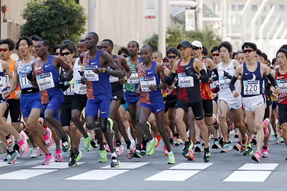 Elite runners start the race at the Tokyo Marathon in Tokyo, Sunday, March 1, 2020. Organizers of the Tokyo Marathon reduced the number of participants out of fear of the spread of the coronavirus from China. The general public was essentially barred from the race. (AP Photo/Shuji Kajiyama)