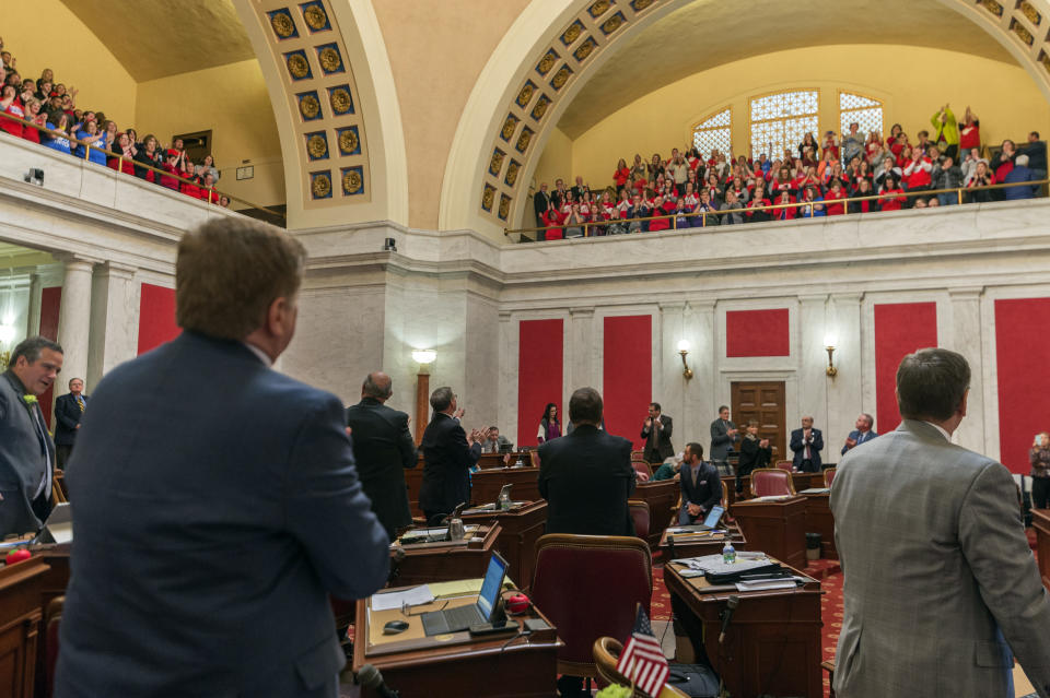 <p>State senators acknowledge the cheers of teachers and school personnel after the passage of a bill to increase pay of state employee by 5 percent at the capitol in Charleston, W.Va., on Tuesday, March 6, 2018. (Photo: Craig Hudson/Charleston Gazette-Mail via AP) </p>