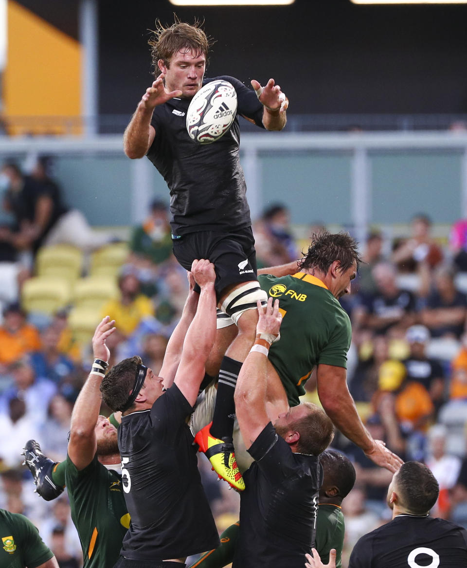 New Zealand's Ethan Blackadder wins a lineout during the Rugby Championship test match between the Springboks and the All Blacks in Townsville, Australia, Saturday, Sept. 25, 2021. (AP Photo/Tertius Pickard)