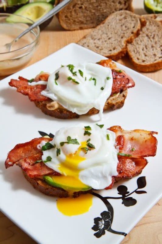 <p>Closet Cooking</p><p>An open-face breakfast sandwich with a runny egg, bacon, avocado and spicy mayo.</p><p><strong>Get The Recipe: <a href="https://www.closetcooking.com/poached-egg-on-toast-with-chipotle/" rel="nofollow noopener" target="_blank" data-ylk="slk:Poached Egg on Toast with Chipotle Mayonnaise;elm:context_link;itc:0;sec:content-canvas" class="link ">Poached Egg on Toast with Chipotle Mayonnaise</a></strong></p>