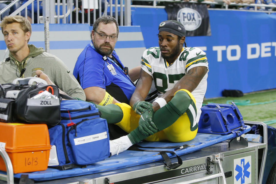 Green Bay Packers wide receiver Romeo Doubs is helped off the field during the first half of an NFL football game against the Detroit Lions, Sunday, Nov. 6, 2022, in Detroit. (AP Photo/Duane Burleson)