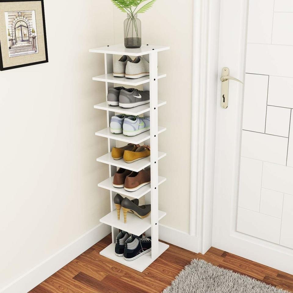 Put this in your entryway, and it will look organized and elevated. Not to mention, you won't trip over a pile of shoes every time you come home.<br /><br /><strong>Promising review:</strong> "My hubby looked all over for a tall and narrow shoe stand. This one was perfect. He tucked it in between a dresser and a wall and it fit perfectly. <strong>This is very sturdy, well balanced, and looks nice.</strong> I would definitely buy it again if I needed one." &mdash; <a href="https://www.amazon.com/gp/customer-reviews/R2A6H4GZZY7VA4?&amp;linkCode=ll2&amp;tag=huffpost-bfsyndication-20&amp;linkId=5e700d36c367cef03258ed064f992072&amp;language=en_US&amp;ref_=as_li_ss_tl" target="_blank" rel="nofollow noopener noreferrer" data-skimlinks-tracking="5854435" data-vars-affiliate="Amazon" data-vars-href="https://www.amazon.com/gp/customer-reviews/R2A6H4GZZY7VA4?tag=bfmal-20&amp;ascsubtag=5854435%2C9%2C37%2Cmobile_web%2C0%2C0%2C16324249" data-vars-keywords="cleaning,fast fashion" data-vars-link-id="16324249" data-vars-price="" data-vars-product-id="20942385" data-vars-product-img="" data-vars-product-title="" data-vars-retailers="Amazon">KH<br /><br /></a><strong>Get it from Amazon for <a href="https://www.amazon.com/Tangkula-Entryway-Organizer-Multi-Function-Vertical/dp/B07R6D3MG2?&amp;linkCode=ll1&amp;tag=huffpost-bfsyndication-20&amp;linkId=85ad5ffac484bf362cb8e5ca5867f80f&amp;language=en_US&amp;ref_=as_li_ss_tl" target="_blank" rel="nofollow noopener noreferrer" data-skimlinks-tracking="5854435" data-vars-affiliate="Amazon" data-vars-asin="B07BHG8643" data-vars-href="https://www.amazon.com/dp/B07BHG8643?tag=bfmal-20&amp;ascsubtag=5854435%2C9%2C37%2Cmobile_web%2C0%2C0%2C16323361" data-vars-keywords="cleaning,fast fashion" data-vars-link-id="16323361" data-vars-price="" data-vars-product-id="17989311" data-vars-product-img="https://m.media-amazon.com/images/I/41ptCOz7RlL._SL500_.jpg" data-vars-product-title="Tangkula 7 Tiers Vertical Shoe Rack, Entryway Wooden Shoes Racks, Modern Shoe Rack Organizer, Space Saving Shoes Storage Stand, Storage Shelf (White, Single)" data-vars-retailers="Amazon">$59.99+</a> (available in two colors and sizes).</strong>