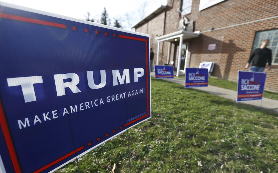 Signs promoting President Trump and Republican Rick Saccone outside a campaign rally on March 5, 2018, in Waynesburg, Pa. Saccone is running against Democrat Conor Lamb in a special election being held on March 13 for the Pennsylvania 18th Congressional District vacated by Republican Tim Murphy. (Photo: Keith Srakocic/AP)