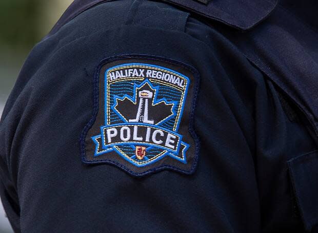 A Halifax Regional Police emblem is seen on a police officer in Halifax on July 2, 2020. Police are investigating after two men broke into a Dartmouth home on Saturday afternoon (Andrew Vaughan/The Canadian Press - image credit)