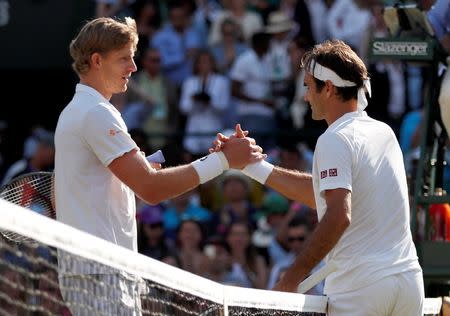 Tennis - Wimbledon - All England Lawn Tennis and Croquet Club, London, Britain - July 11, 2018. South Africa's Kevin Anderson celebrates winning his quarter final match against Switzerland's Roger Federer . REUTERS/Andrew Boyers