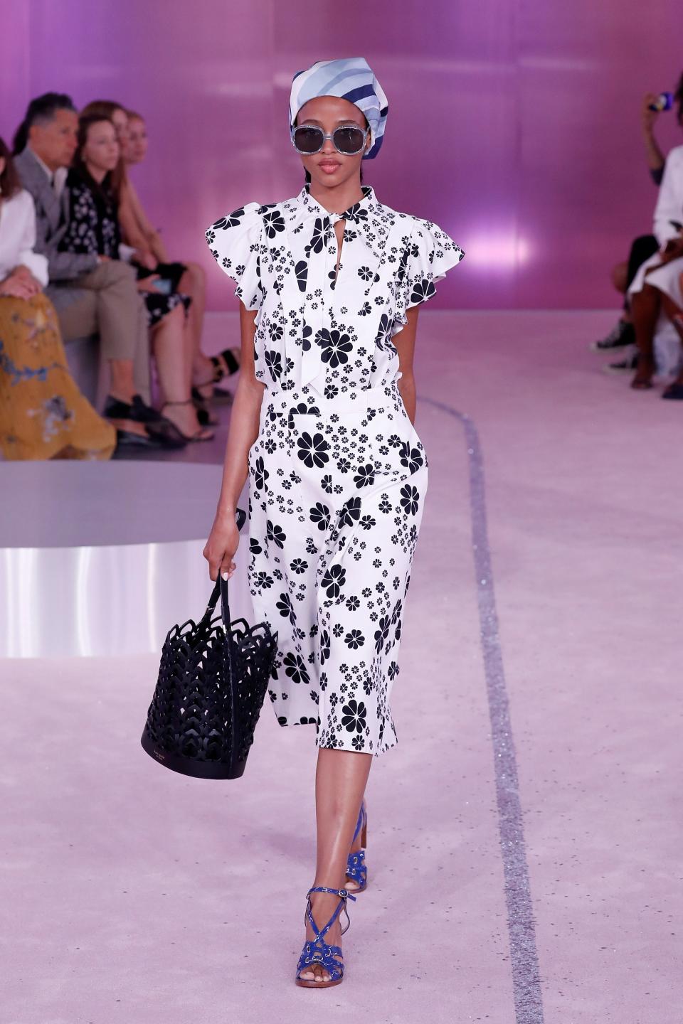 Kate Spade New York staged its first-ever runway show at the New York Public Library on Friday. The show included a tribute to founder Kate Valentine Spade.