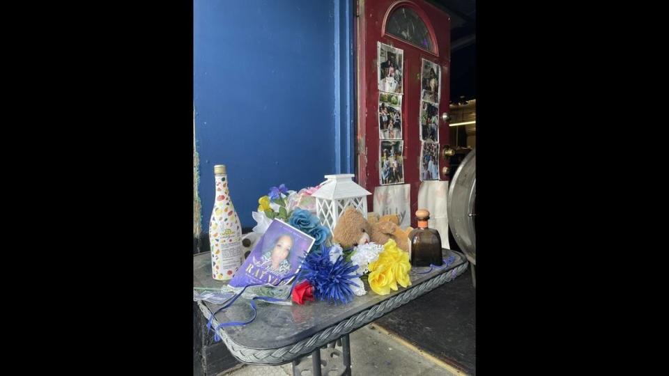 A memorial for Antoinette “Libby” Brenson was set up inside the Klymax Lounge following the May shooting. Another member of Brenson’s family died in a shooting shortly after. Their flowers and funeral mementos have been combined ahead of the August event scheduled to commemorate Brenson’s life.
