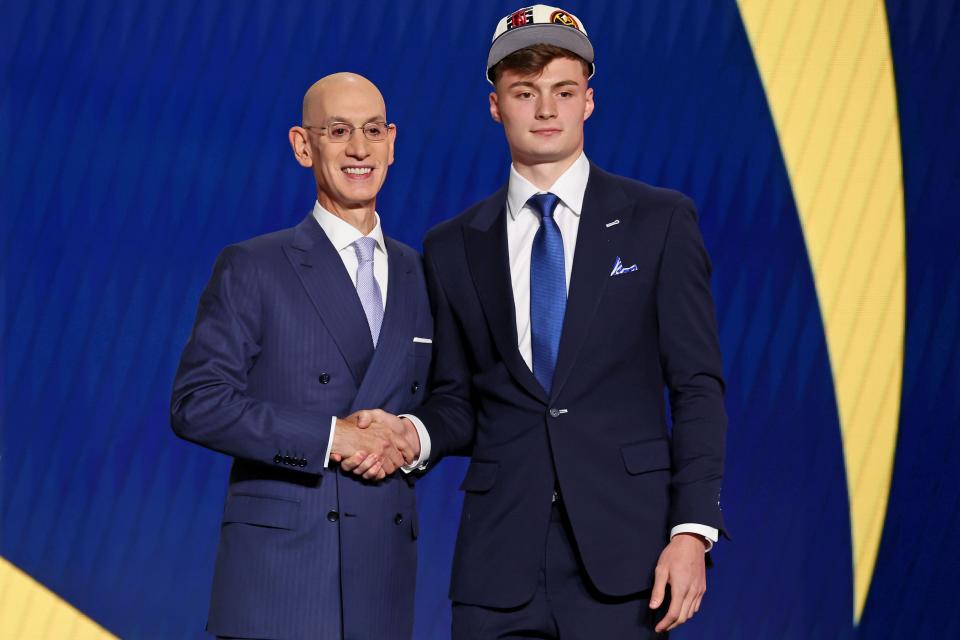 Christian Braun, right, was selected by the Denver Nuggets in the first round of the 2022 NBA draft.