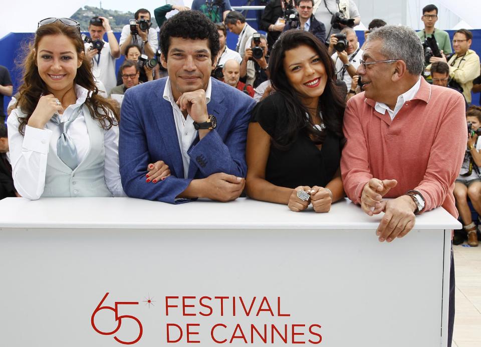 From left, actors Menna Shalaby, Bassem Samra, Nahed El Sebai, and director Yousry Nasrallah pose during a photo call for After the Battle at the 65th international film festival, in Cannes, southern France, Thursday, May 17, 2012. (AP Photo/Francois Mori)