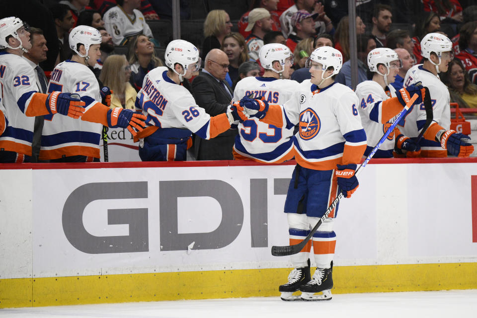 New York Islanders defenseman Ryan Pulock (6) celebrates his goal during the first period of an NHL hockey game against the Washington Capitals, Tuesday, April 26, 2022, in Washington. (AP Photo/Nick Wass)