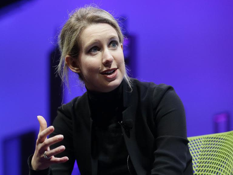 Elizabeth Holmes is accused of fraud on a massive scale. So why is everyone obsessed with her voice?