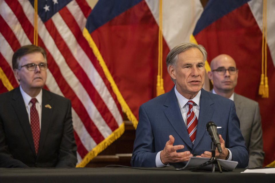 Texas Governor Greg Abbott announces the reopening of more Texas businesses during the COVID-19 pandemic at a press conference at the Texas State Capitol in Austin on Monday, May 18, 2020. Abbott said that childcare facilities, youth camps, some professional sports, and bars may now begin to fully or partially reopen their facilities as outlined by regulations listed on the Open Texas website. (Lynda M. Gonzalez/The Dallas Morning News via AP, Pool)