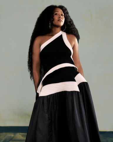 <p>Joshua Kissi</p> Issey Miyake top and skirt, and stylistâ€™s own earrings.