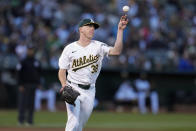 Oakland Athletics pitcher JP Sears throws to first base for the out on Miami Marlins' Josh Bell during the fourth inning of a baseball game Friday, May 3, 2024, in Oakland, Calif. (AP Photo/Godofredo A. Vásquez)