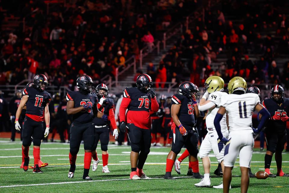 The Aliquippa Quips' offensive line gets to the line of scrimmage prior to a play Thursday night in the PIAA Class 4A championship game.