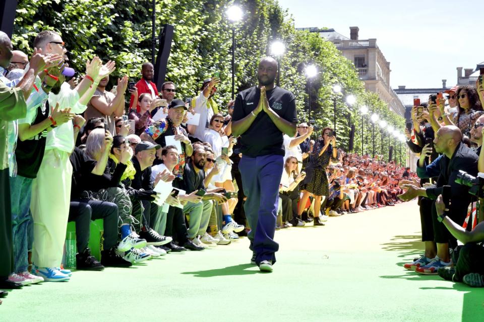 Abloh at the finale of his Louis Vuitton show in June 2018. - Credit: WWD