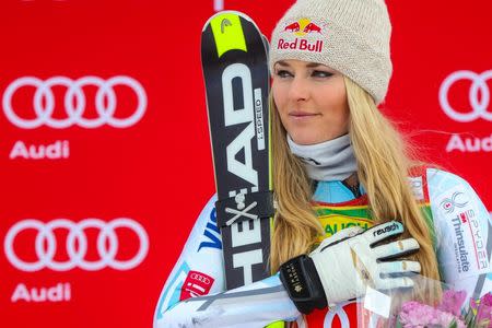 Dec 6, 2015; Lake Louise, Alberta, Canada; First place finisher Lindsey Vonn of the United States takes the podium during the women's Super G race in the FIS alpine skiing World Cup at Lake Louise Ski Resort. Mandatory Credit: Sergei Belski-USA TODAY Sports