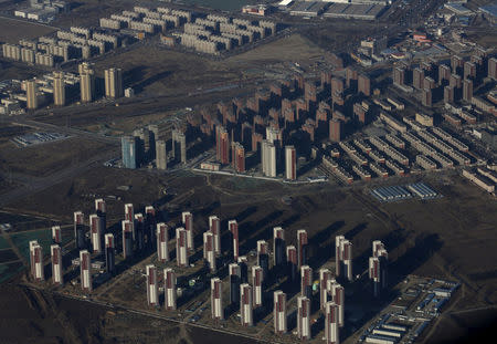 Apartments are pictured from a plane on the outskirts of Beijing January 8, 2016. REUTERS/Kim Kyung-Hoon/File Photo