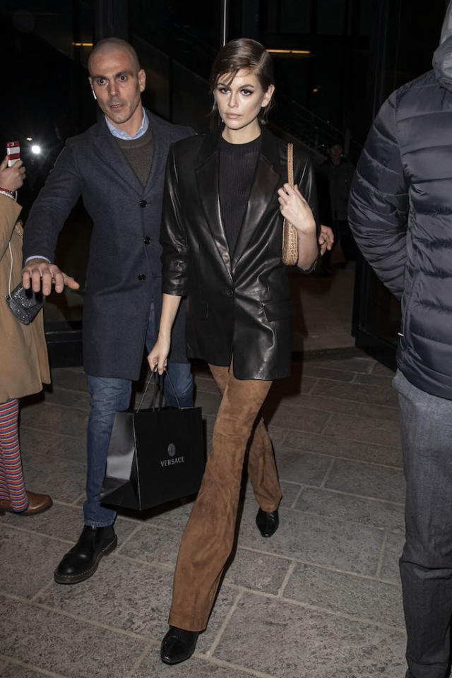 Versace - Kendall Jenner and Gigi Hadid are a stylish pair while out  together in Paris wearing #Versace accessories. Kendall wears the Versace  Zip-Up Ankle Bootie while Gigi carries her DV1 Bag