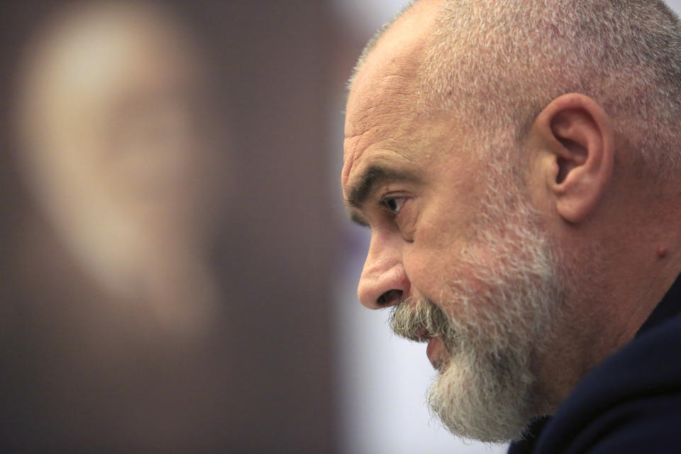 Albanian Prime Minister Edi Rama, listens a question during an interview with the Associated Press, in Tirana, Albania , on Tuesday, April 20, 2021. Albania holds parliamentary elections on Sunday, April 25. (AP Photo/Hektor Pustina)