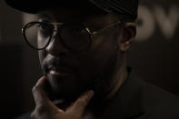 American musician will.i.am, front man for Black Eyed Peas listens during an interview in Jerusalem, where he spoke at an innovation conference held by Improvate, Monday, Nov. 29, 2021. will.i.am said Monday that politics don’t dictate his actions, with pressure from pro-Palestinian activists unable to deter him from performing in Israel. (AP Photo/Maya Alleruzzo)