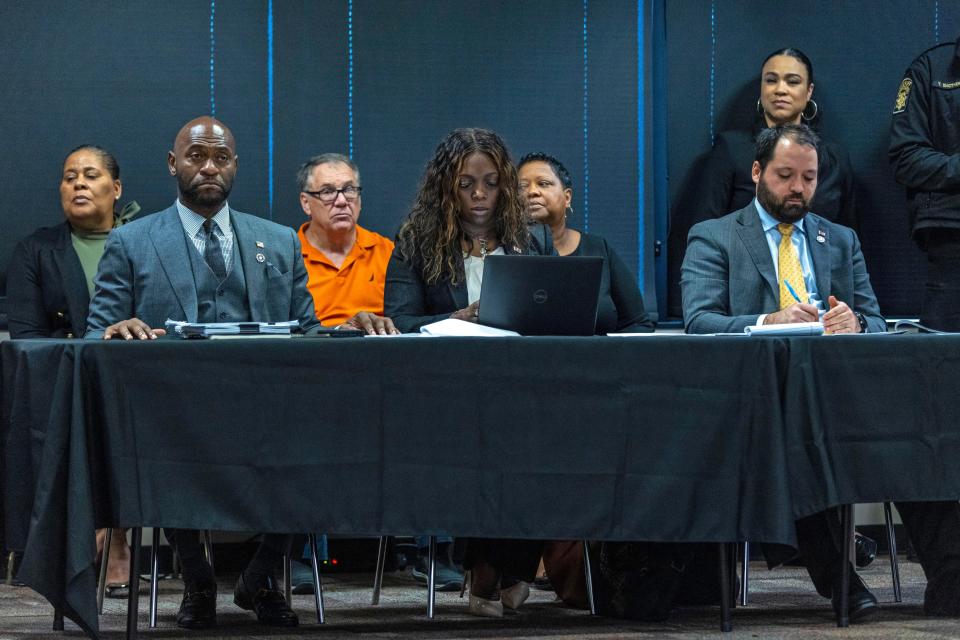 Fulton County District Attorney Special Prosecutor Nathan Wade, left, Executive District Attorney Daysha Young and Attorney Alex Bernice, listen as Superior Court Judge Scott McAfee addresses potential jurors during jury selection for lawyer Kenneth Chesebro's trial, Friday, Oct. 20, 2023, at the Fulton County Courthouse in Atlanta. Jury selection began Friday for Chesebro, the first defendant to go to trial in the Georgia case that accuses former President Donald Trump and others of illegally scheming to overturn the 2020 election in the state. (Alyssa Pointer/Pool Photo via AP)