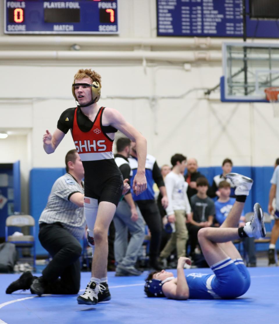 Pearl River's John Greenan and Sleepy Hollow's Tiernan Fahy wrestle in the 124-pound weight class during the Sec 1 Div II Dual Meet Tournament finals at Pearl River High School Dec. 20, 2023. Fahy won the match.