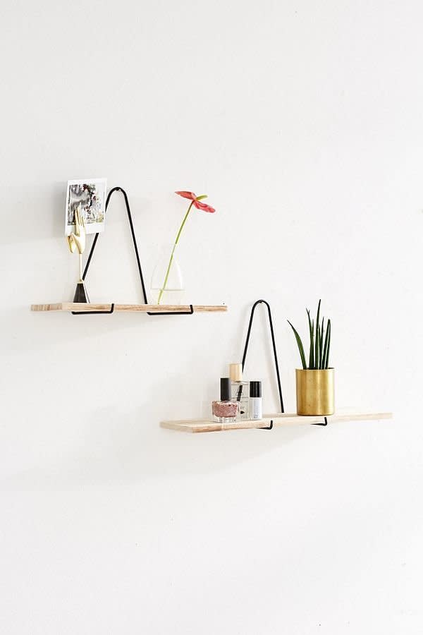 Get it <a href="https://www.urbanoutfitters.com/shop/carter-triangle-bracket-wall-shelf?category=shelving&amp;color=001" target="_blank">here</a> starting at $8.