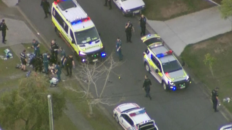 Aerial footage shows paramedics and several police vehicles on the scene.