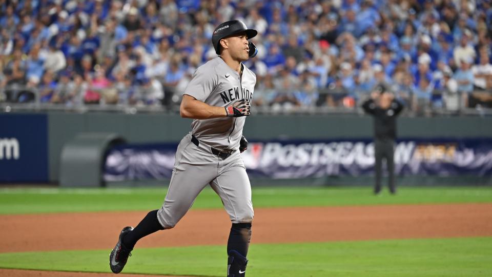 October 9, 2024; Kansas City, Missouri, USA; New York Yankees design hitter Giancarlo Stanton (27) runs the bases after hitting a home run in the eighth inning against the Kansas City Royals during game three of the NLDS for the 2024 MLB Playoffs at Kauffman Stadium. Mandatory credit: Peter Aiken-Imagn images