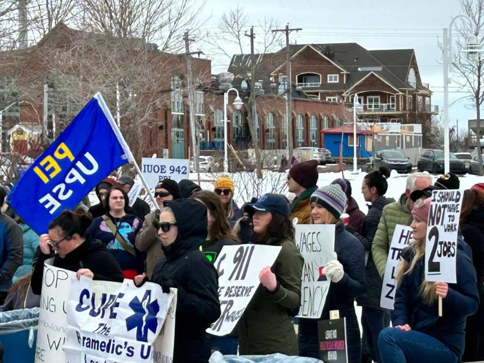 More than 100 people gathered at Confederation Landing Park in Charlottetown on Saturday to call for better wages. (Shane Ross/CBC - image credit)