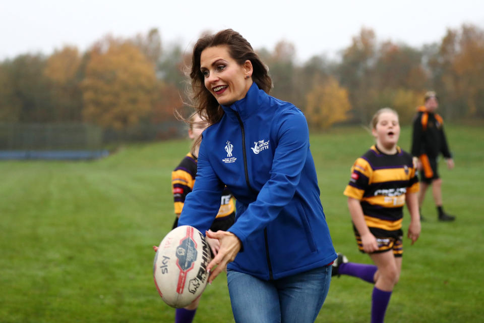 Women's Rugby League legends Rebecca Stevens and Jane Banks join children from Haydock ARLFC on the morning of the women's semi-finals to celebrate National Lottery support to rugby league at Haydock ARLFC on November 14, 2022 in St Helens, England. (Photo by George Wood/Getty Images for The National Lottery)