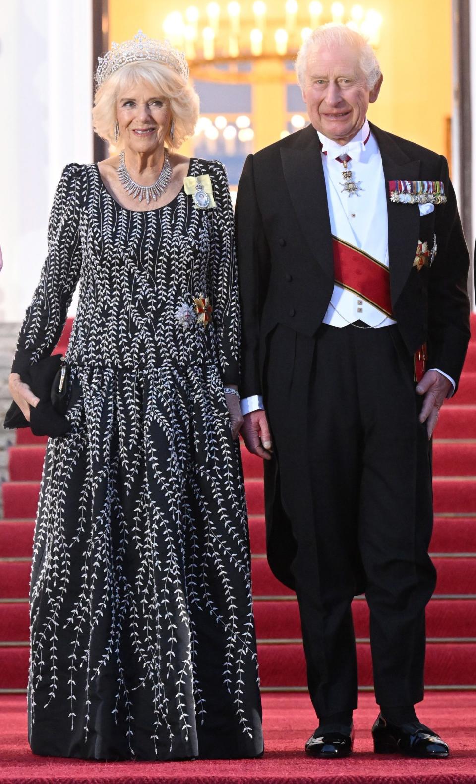 Camilla’s black and silver embroidered top and skirt was designed by Bruce Oldfield - WireImage