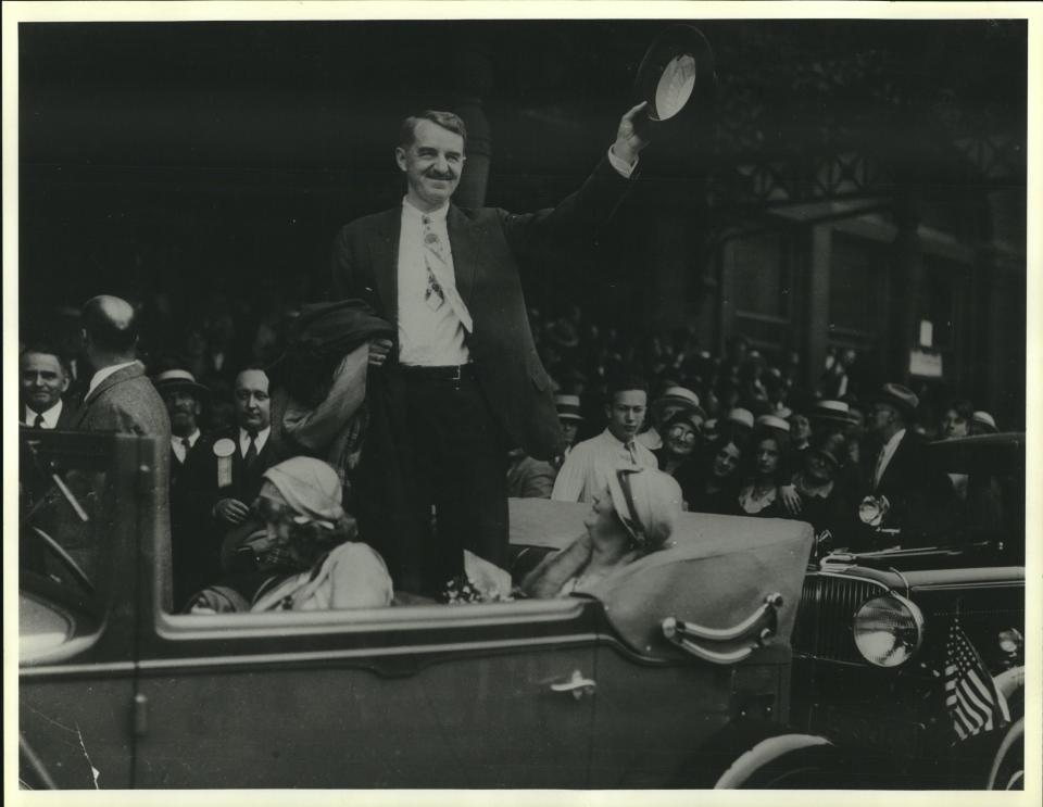 Milwaukee Mayor Dan Hoan waves to the crowd from a touring car in this undated photo. Hoan was Milwaukee's mayor from 1916 to 1940.