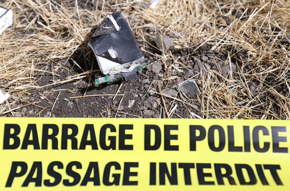 A component from a computer is seen behind a police cordon at the scene of the Ethiopian Airlines Flight ET 302 plane crash, near the town of Bishoftu, southeast of Addis Ababa, Ethiopia March 11, 2019. (Photo: Tiksa Negeri/Reuters)