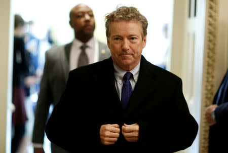 FILE PHOTO: Senator Rand Paul (R-KY) walks from Senate Republican weekly policy luncheon on Capitol Hill in Washington, U.S., March 6, 2018. REUTERS/Joshua Roberts/File Photo