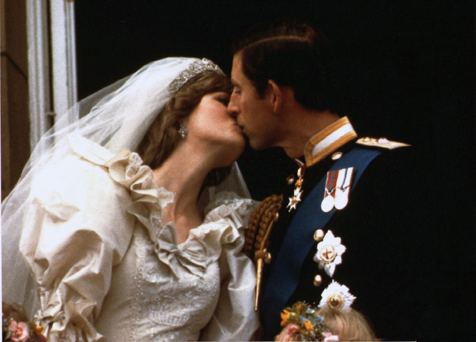 FILE PHOTO 29JUL81- Prince Charles kisses his new bride Diana on their wedding day July 29, 1981. Diana and her millionaire companion Dodi Al Fayed were killed early Sunday when their car crashed in a Paris tunnel underpass.    FRANCE DIANA