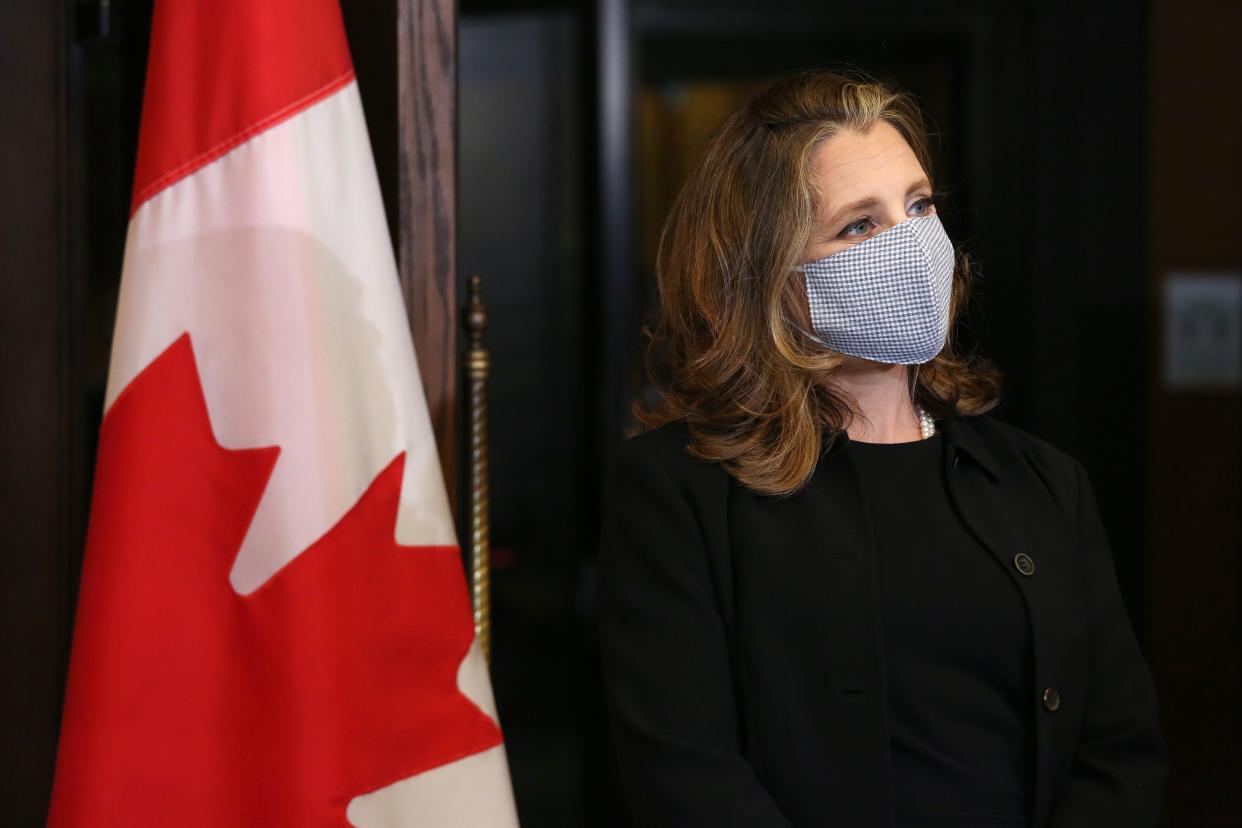 Canada's Deputy Prime Minister/Finance Minister Chrystia Freeland wears a facemask during a news conference on Parliament Hill August 18, 2020 in Ottawa, Canada. - Prime Minister Justin Trudeau tapped Chrystia Freeland to be Canada's first female finance minister on Tuesday as an ethics scandal that clipped her predecessor's wings reverberates through the government. Freeland received a standing ovation after being sworn in at a small ceremony at Rideau Hall, the official residence of Governor General Julie Payette in Ottawa. (Photo by Dave Chan / AFP) (Photo by DAVE CHAN/AFP via Getty Images)