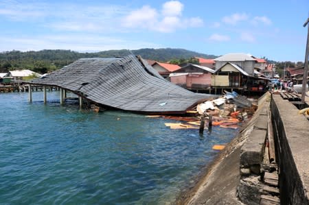 A damaged traditional market building is pictured following an earthquake in Ambon