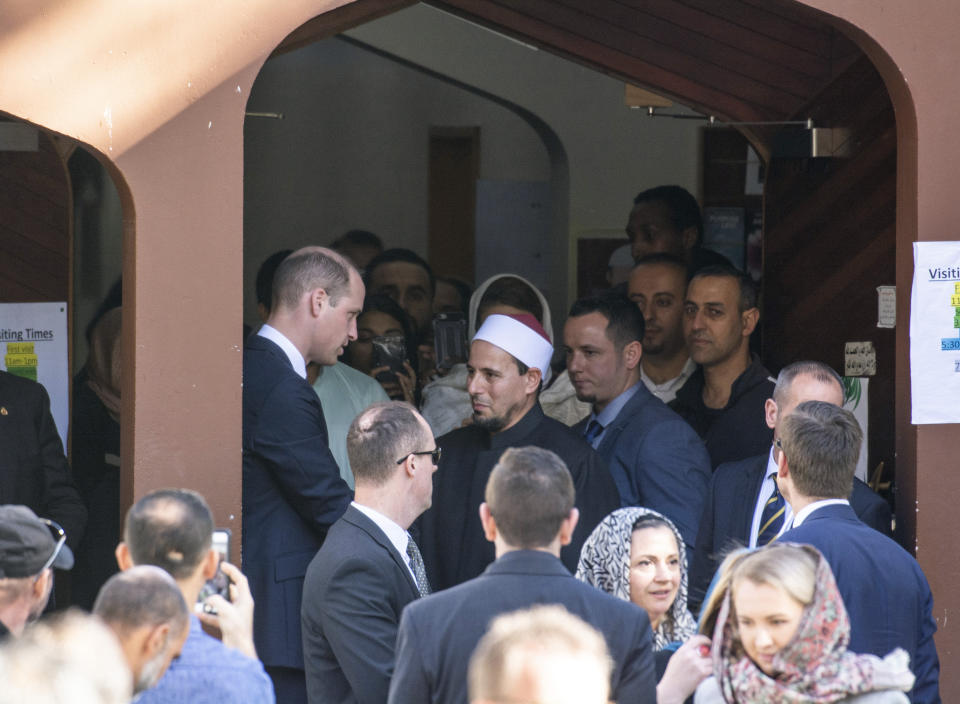 Britain's Prince William, left, speaks with Imam Gamel Fouda as he departs the Al Noor mosque, one of the mosques in the mass shooting, in Christchurch, New Zealand, Friday, April 26, 2019. Prince William visited one of the two Christchurch mosques where 50 people were killed and 50 others wounded in a March 15 attack by a white supremacist. (David Alexander/SNPA via AP)