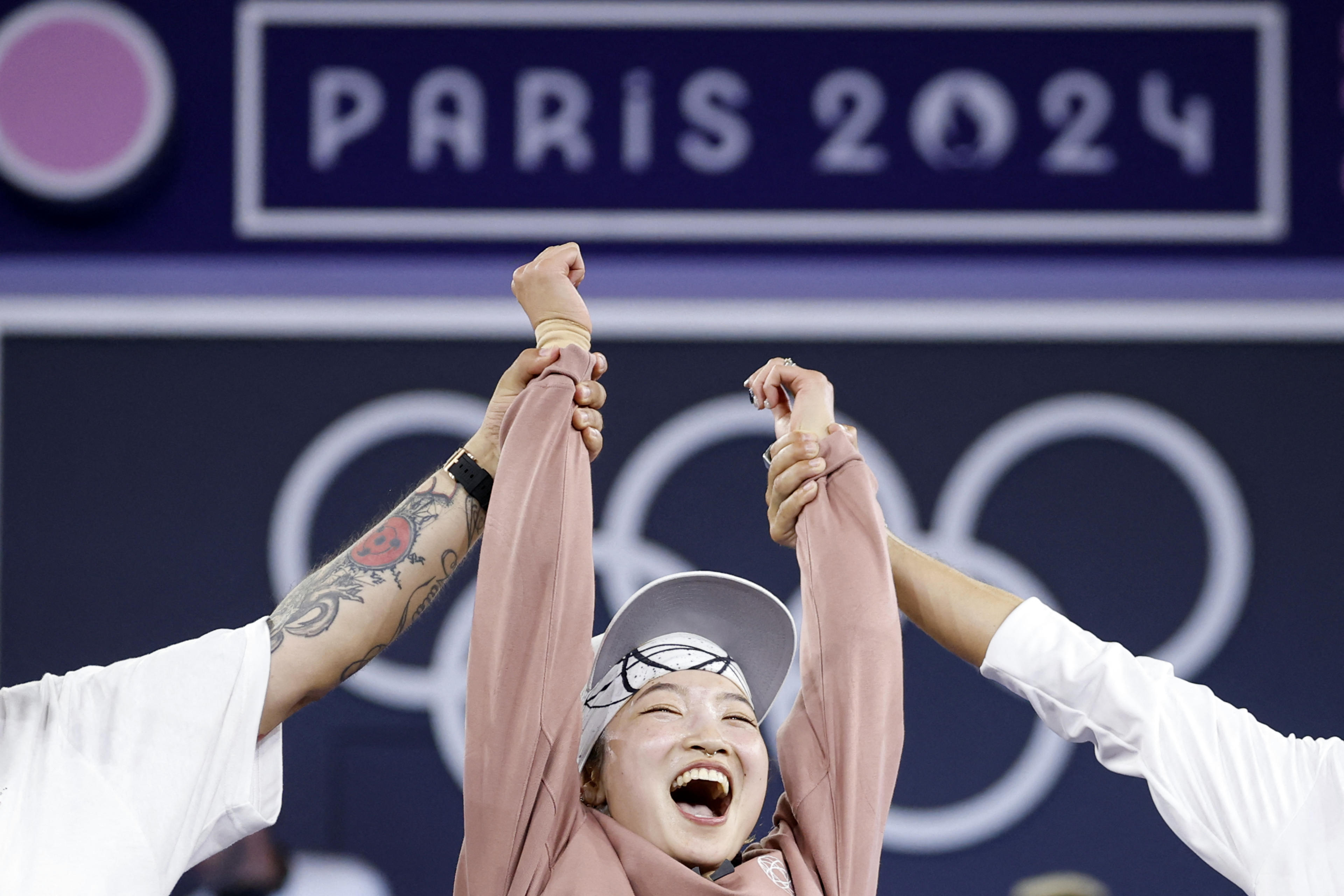 Japan's Ami Yuasa, known as Ami, celebrates winning the gold medal at the end of the women's breakdancing gold medal match at the Paris 2024 Olympic Games at La Concorde in Paris on August 9, 2024. (Odd Andersen/AFP/Getty Images)