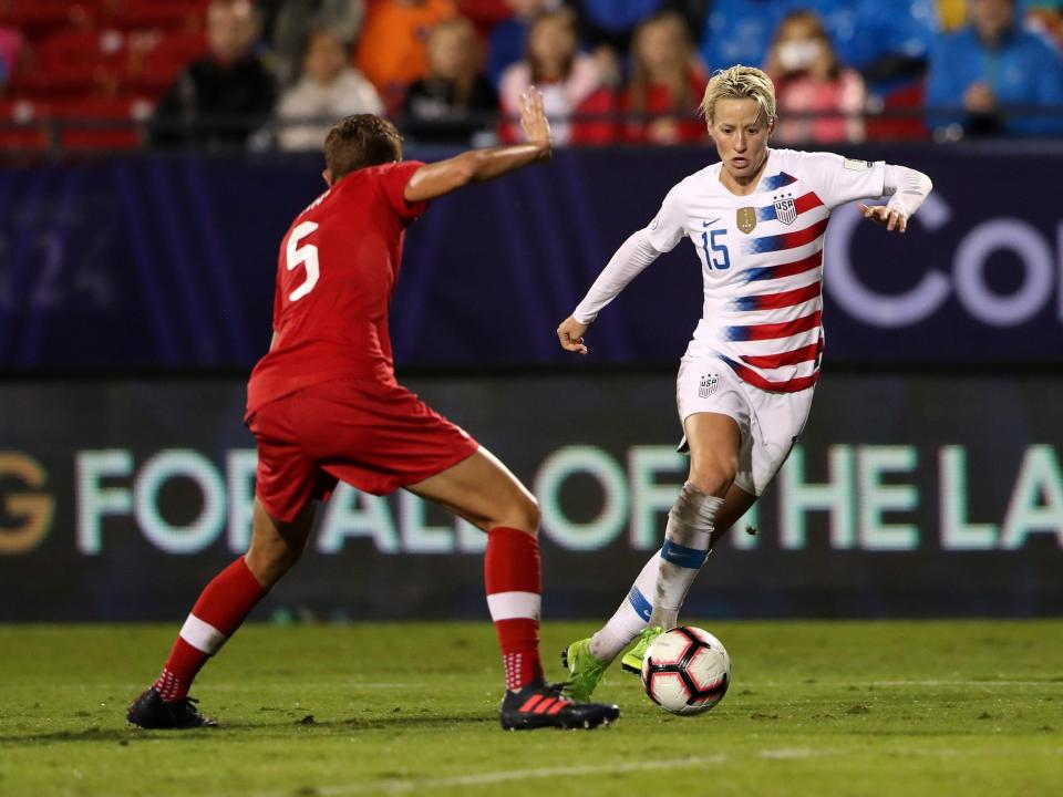 Megan Rapinoe controls the ball for the USWNT during a 2018 match against Canada.