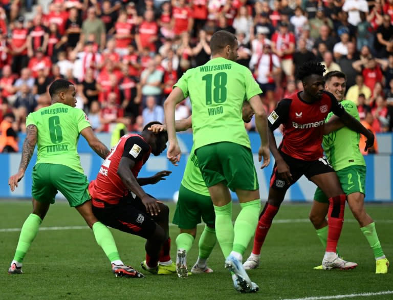 Winning moment: Bayer Leverkusen's Victor Boniface (2nd L) shoots to score (INA FASSBENDER)