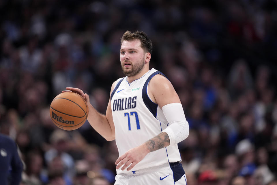 Dallas Mavericks' Luka Doncic handles the ball during an NBA basketball game against the Golden State Warriors in Dallas, Wednesday, March 13, 2024. (AP Photo/Tony Gutierrez)